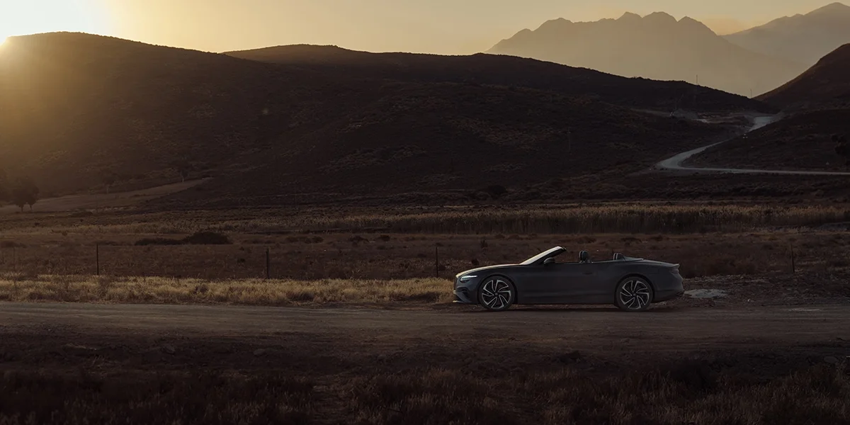 2026 Bentley Continental GT S parked in front of a modern luxury home in Rancho Mirage, CA.