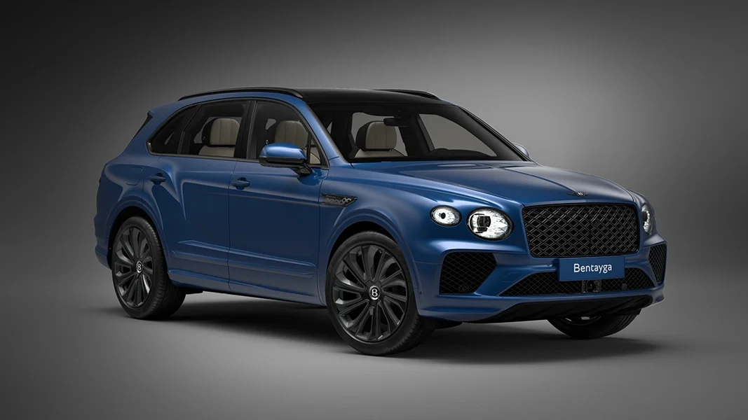 %(YEAR)
Bentley %(MODEL) parked in front of a modern luxury home in Rancho Mirage, CA.